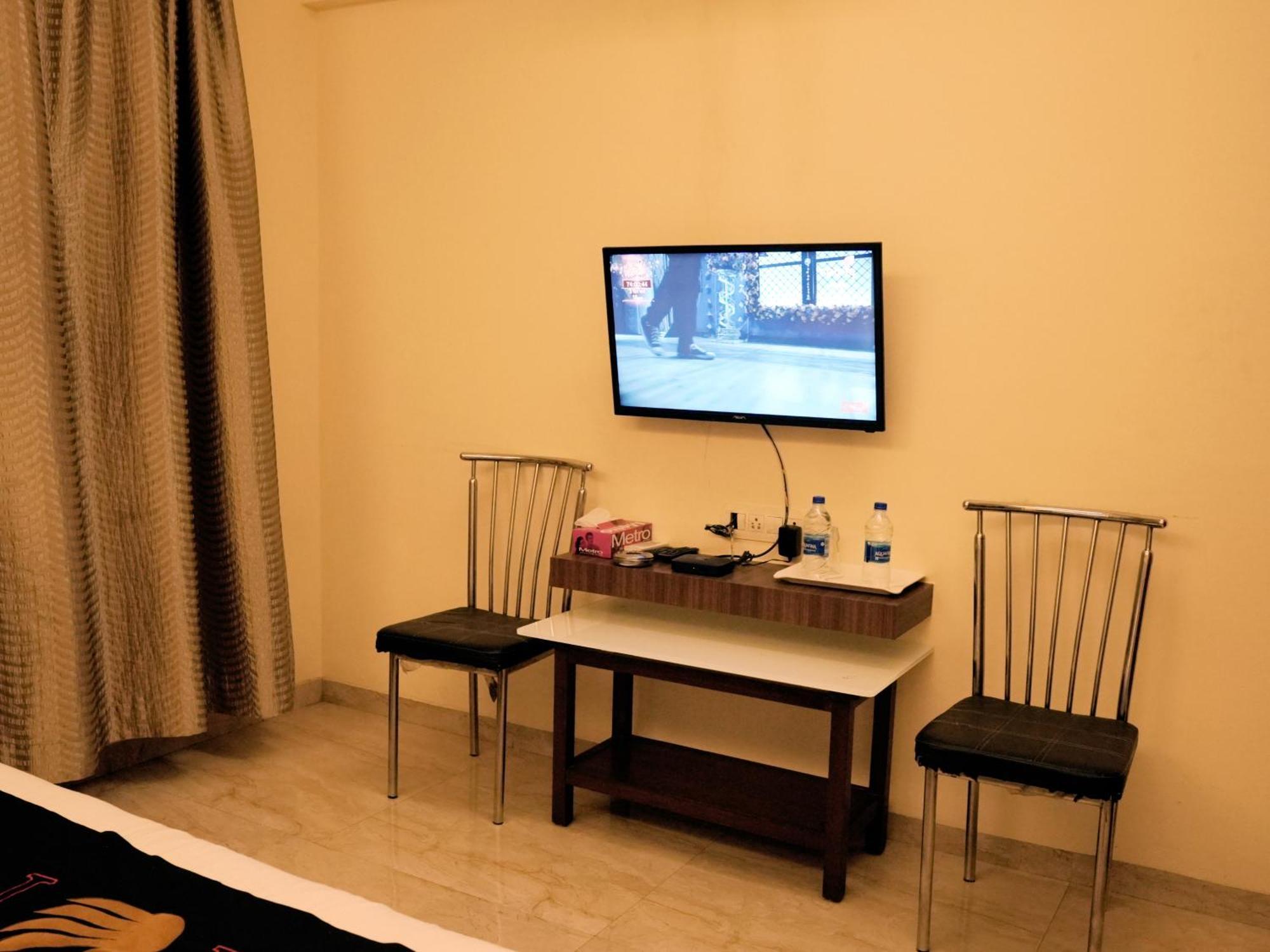 Hotel Kushala Executive Inn Тане Екстериор снимка